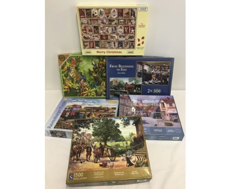 6 boxed 1,000 piece jigsaw puzzles of rural towns and villages. To include Ravensburger, Gibson & House of Puzzles. 