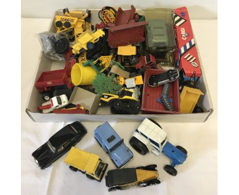 A box of mixed die cast vehicles and farm machinery. To include Corgi, Dinky and Solido. 