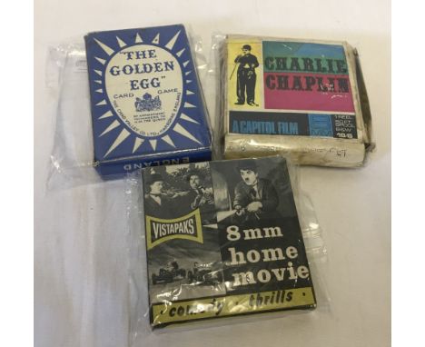 2 boxed vintage 8mm black and white films together with a Chad Valley Golden Egg card game. Charlie Chaplin by Capitol and Vi