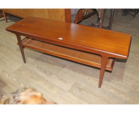 A retro 1960s teak and cane coffee table by John Herbert for Younger, length 137cm.  General wear to include some marks and l