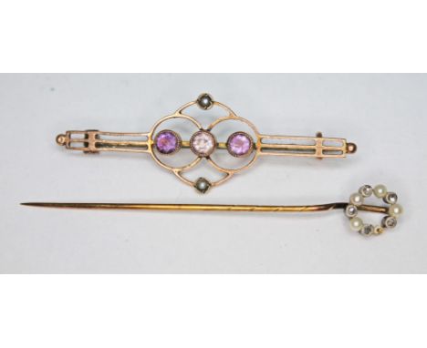 A diamond and pearl set stick pin unmarked, together with a brooch marked '9c', gross wt. 3.12g.  