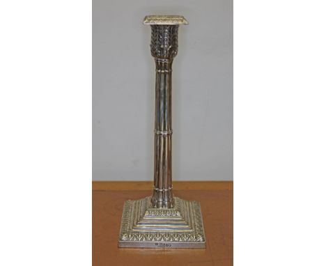 A Victorian silver candlestick of Gothic column form with acanthus capitol and stepped base, William Hutton &amp; Sons (Edwar