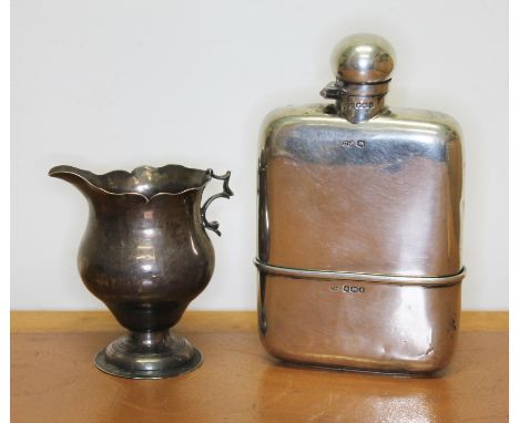 Hallmarked silver comprising a hip flask and an 18th century jug, both as found, gross wt. 8 1/2oz.&nbsp;Condition - jug miss