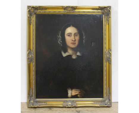 19th Century School, portrait of a lady, oil on canvas, unsigned, 60cm x 75cm.Condition - hole to mid right, canvas re-stretc