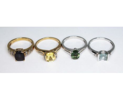A group of four coloured gemstones and diamond rings, all hallmarked 9ct gold, gross wt. 10.24g, size K-M.  