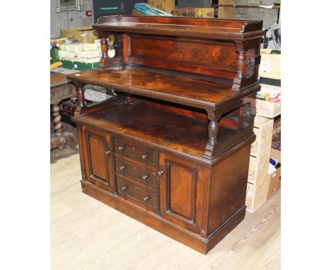 A 19th century rosewood buffet/serving table, enamel label 'H. Ogden & Son Manchester', height 126cm, width 116cm and depth 5