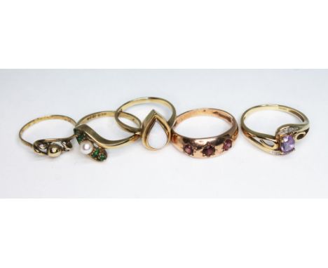 A group of five hallmarked 9ct gold rings, various settings, gross wt. 9.37g, size K-P.  