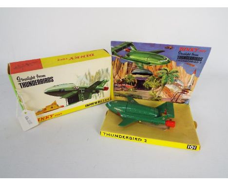 Dinky - A boxed 1st issue # 101 Thunderbirds 2 &amp; 4, the model appears in Very Good condition with little sign of play use