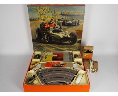 Victory Industries - A boxed 1950s VIP Raceways # R1 Set with Cooper and Lotus cars, the contents appear in Very Good conditi
