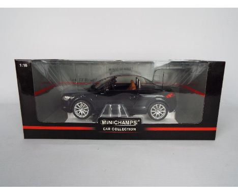 Minichamps - A boxed 1:18 scale Minichamps #15030 Audi TT Roadster 2006. The model in Black appears to be in Mint condition, 