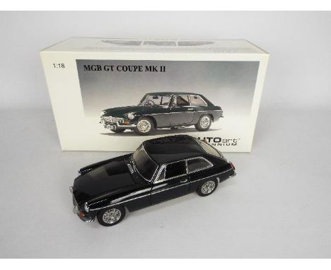 AutoArt Millenium - A boxed AutoArt 1:18th scale #73526 MGB GT Mk.II. The model in green appears to be in Very Good overall c