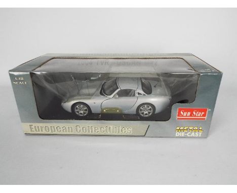 Sun Star - A boxed 1:18 scale Sun Star #4462 2004 TVR Tuscan Mk2. The model in Spectra Flair Silver appears to be in Near Min