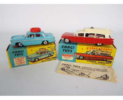 Corgi - 2 x boxed models, # 236 Austin A60 Driving School Car, # 437 Cadillac Superior Ambulance. Both models show light sign