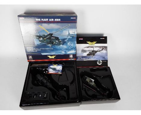 Corgi Aviation Archive - Two boxed 1:72 scale Limited Edition Corgi military helicopters. Lot contains AA39001 Westland WG-13