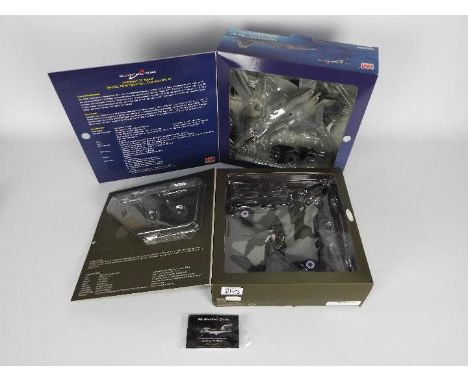 Hobby Master, Sky Guardians - Two boxed 1:72 scale diecast military aircraft. Lot includes Hobby Master Lockheed F-22 Raptor 