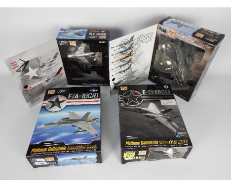 Easy Model - Four boxed 1:72 scale assembled plastic model military aircraft from Easy Model. Lot consists of #37121 F-15 Eag