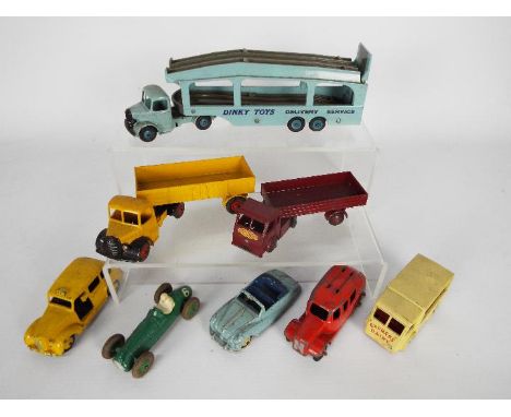 Dinky - A collection of 8 x unboxed models including # 582 Bedford Pullmore Car Transporter with fawn decks, # 140a Austin A9