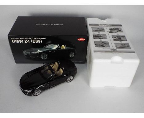 Kyosho - A boxed 1:18 scale Kyosho #08771BK BMW Z4 (E89). The model in black appears to be in Near Mint condition with signs 