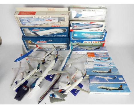 Sky Marks, Other - A fleet of plastic model airliners in a variety of scales from several carriers. Lot includes Boeing 767-3