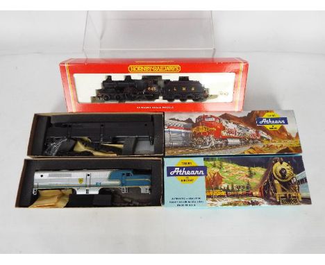 Hornby, Athearn - A boxed OO gauge loco with two boxed HO gauge kits. Lot consists of a Hornby OO gauge R2099B Class 2P 4-4-0