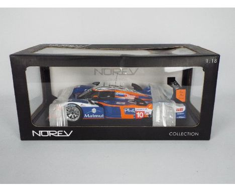 Norev - A Norev 1:18 scale model Peugeot 908 HDI FAP - Le Mans 2011 Team Oreca.  Appears in mint condition in excellent origi