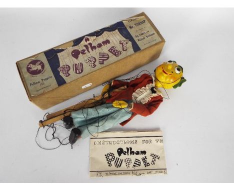 Pelham Puppets - A boxed Televisions Mr Turnip puppet with instruction sheet. The puppet shows some signs of age, he appears 