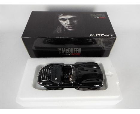 AutoArt - A boxed AutoArt 1:18th scale #73526 Jaguar XK-SS 1956 'Steve McQueen Private Collection'. The model in green appear