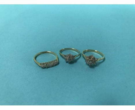 Two 18ct gold rings, 5.4g and a 9ct ring, 1.6g