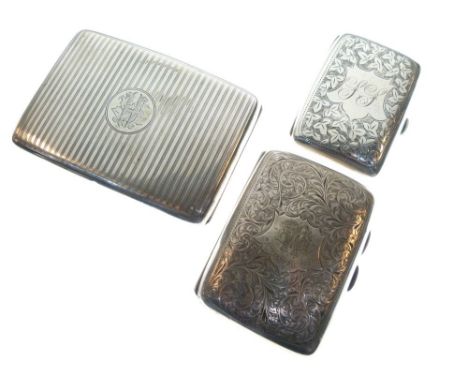 Silver cigarette case with engine turned decoration and two other silver cigarette cases with engraved foliate decoration, 9t