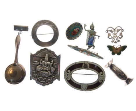 Various brooches to include; two millefiori, Eastern white metal, Siamese enamel, oval enamel, Scottish, an EPNS compact, etc