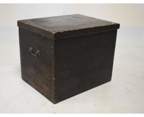 Late 19th/early 20th Century black-lacquered pine trunk or chest, with hinged rectangular cover and side carry handles, 58cm 