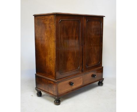 19th Century mahogany press cupboard fitted two blind panel doors enclosing two shelves, the base fitted one long drawer, 116