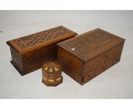 Oriental carved box, the hinged cover decorated with figures in a landscape, one other carved box and a hardwood and brass in