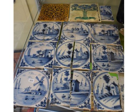 Group of 18th Century and later tiles to include; a group of Delftware-style examples with circular views (most vertically cu