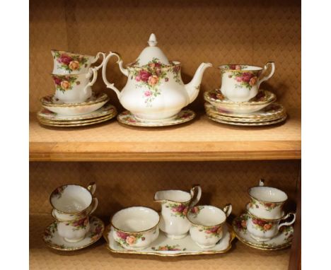 Royal Albert Old Country Roses pattern tea service of eight cups, seven saucers, eight plates, teapot, milk jug, sugar basin 