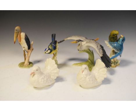 Group of six porcelain bird figurines to include Goebel, the largest a Heron with wings outstretched, 26.5cm wide (6)  