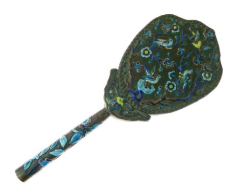 Chinese copper and enamel hand mirror, with shield-shaped bevelled plate, the reverse and cylindrical handle with enamel reli