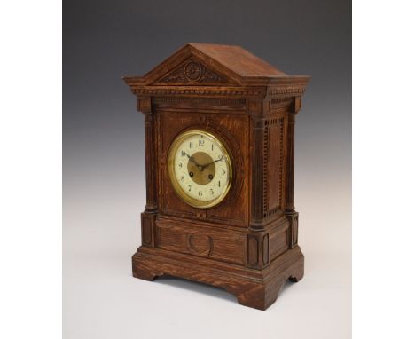 Maple &amp; Co Ltd, Paris - Early 20th Century carved oak-cased mantel or bracket clock, with 4.5-inch Arabic dial, two-train