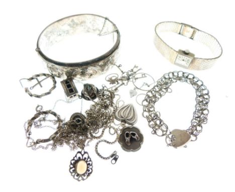 Assorted silver and white metal jewellery to include; silver snap bangle, a lady's wristwatch, chains, pendants etc  