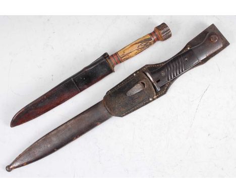 A German Third Reich K-98 Mauser bayonet, the 25cm blued steel blade marked to the ricasso E.u.F. Horster, numbered 431 to th