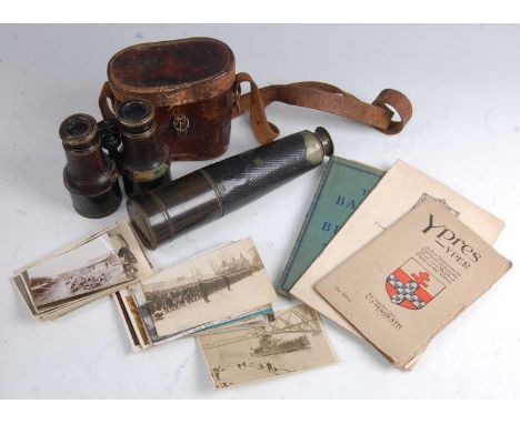 A pair of WW I binoculars with War Department mark in a brown leather case, together with a leather clad four drawer telescop