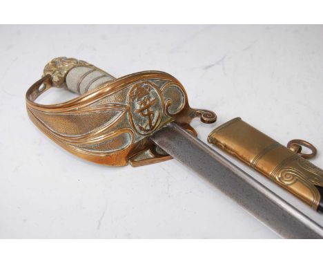 A British 1827 pattern Naval Officer's sword, having a 71cm pipe back quill point blade, the Gothic gilt brass hilt with fold