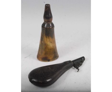 An early 19th century horn powder flask, 18cm, together with an embossed leather shot flask, 21cm. (2)