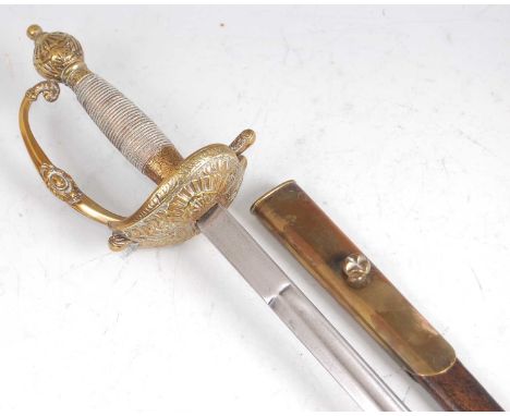 A 19th century dress sword, having an 85cm blade with embossed brass hilt and pommel, housed in a brass mounted leather scabb