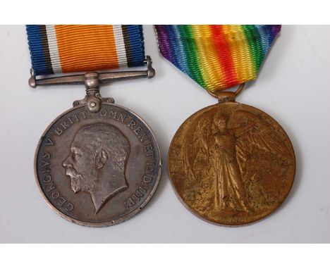 A WW I British War and Victory duo, naming 21928 A. SJT. E. HUGHES. MANCH. R. (2)