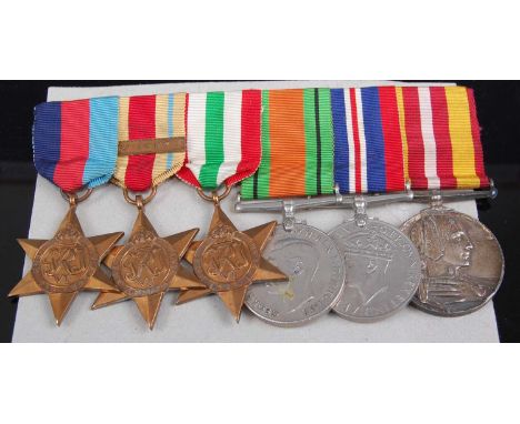 A WW II medal group to include 1939-45 Star, Africa Star with 8th Army clasp, Italy Star, Defence and War, together with a Vo