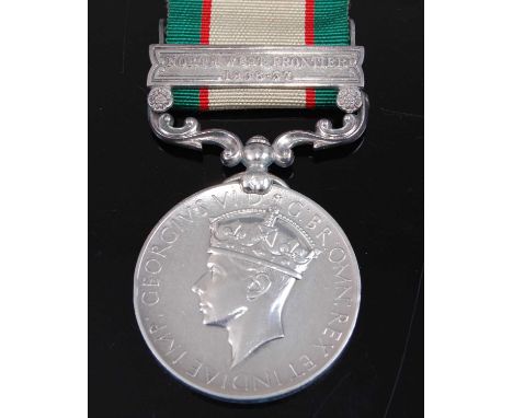 An India General Service medal (1936-1939) with North West Frontier 1936-37 clasp, naming 10527 SEPOY SAMUNDAR KHAN. 2-1 PUNJ