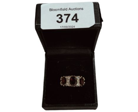 VINTAGE SILVER 3 STONE GARNET RING