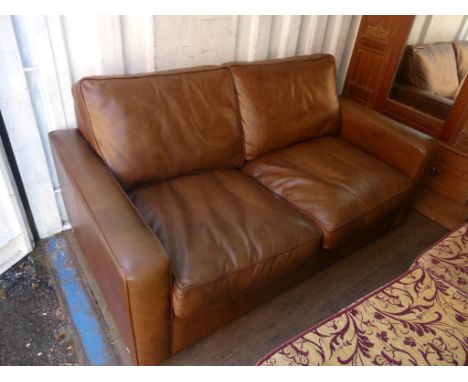 A good quality modern brown leather two seater sofa bed.   CONDITION REPORT:  Width 160cmDepth 90cmSome surface marks from us