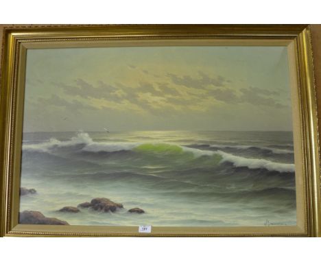 A 20th Century Italian School seascape with rocks, oil on canvas in a gilt finished frame with integral picture light